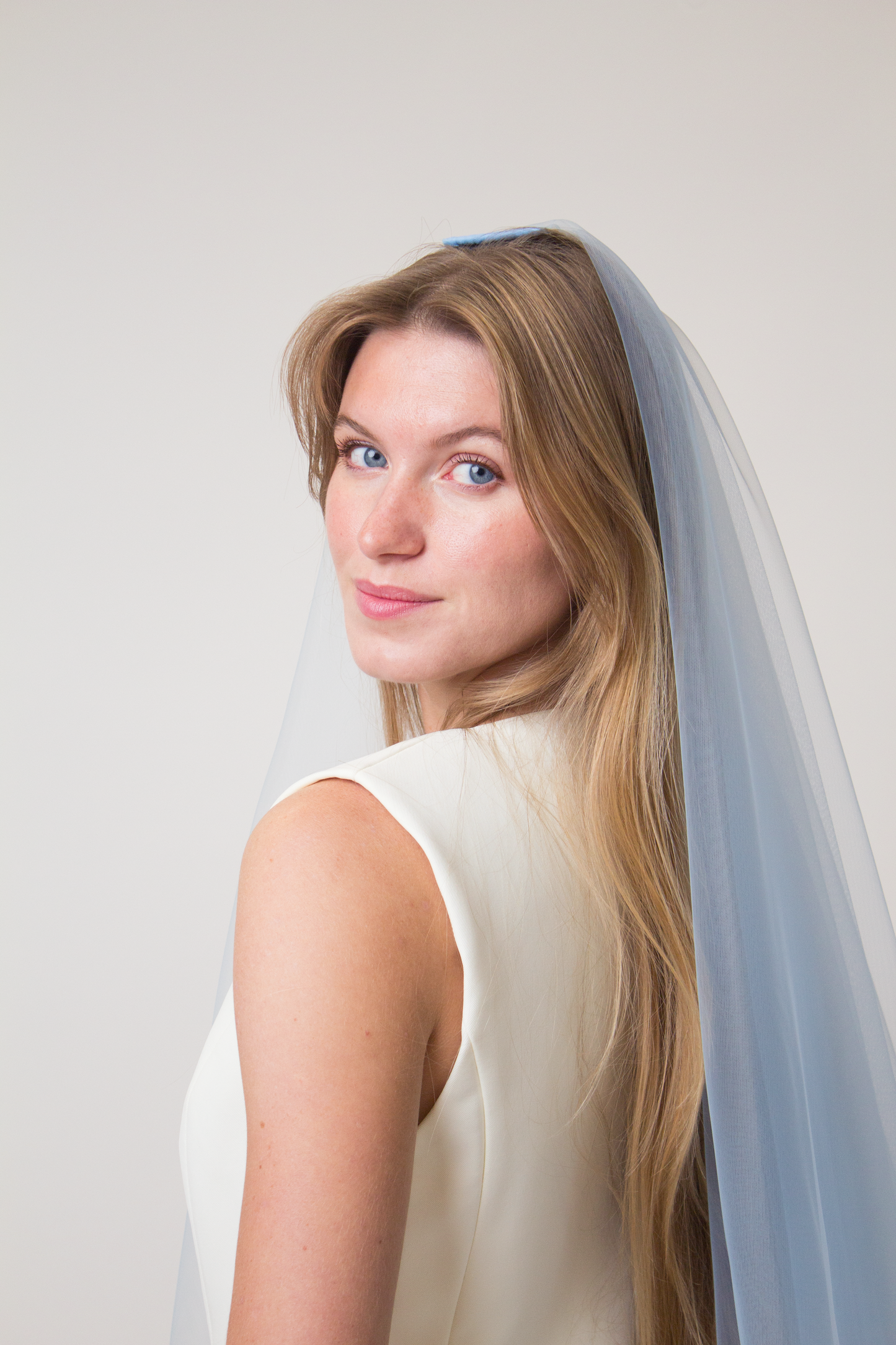 Sky blue veil with a blusher