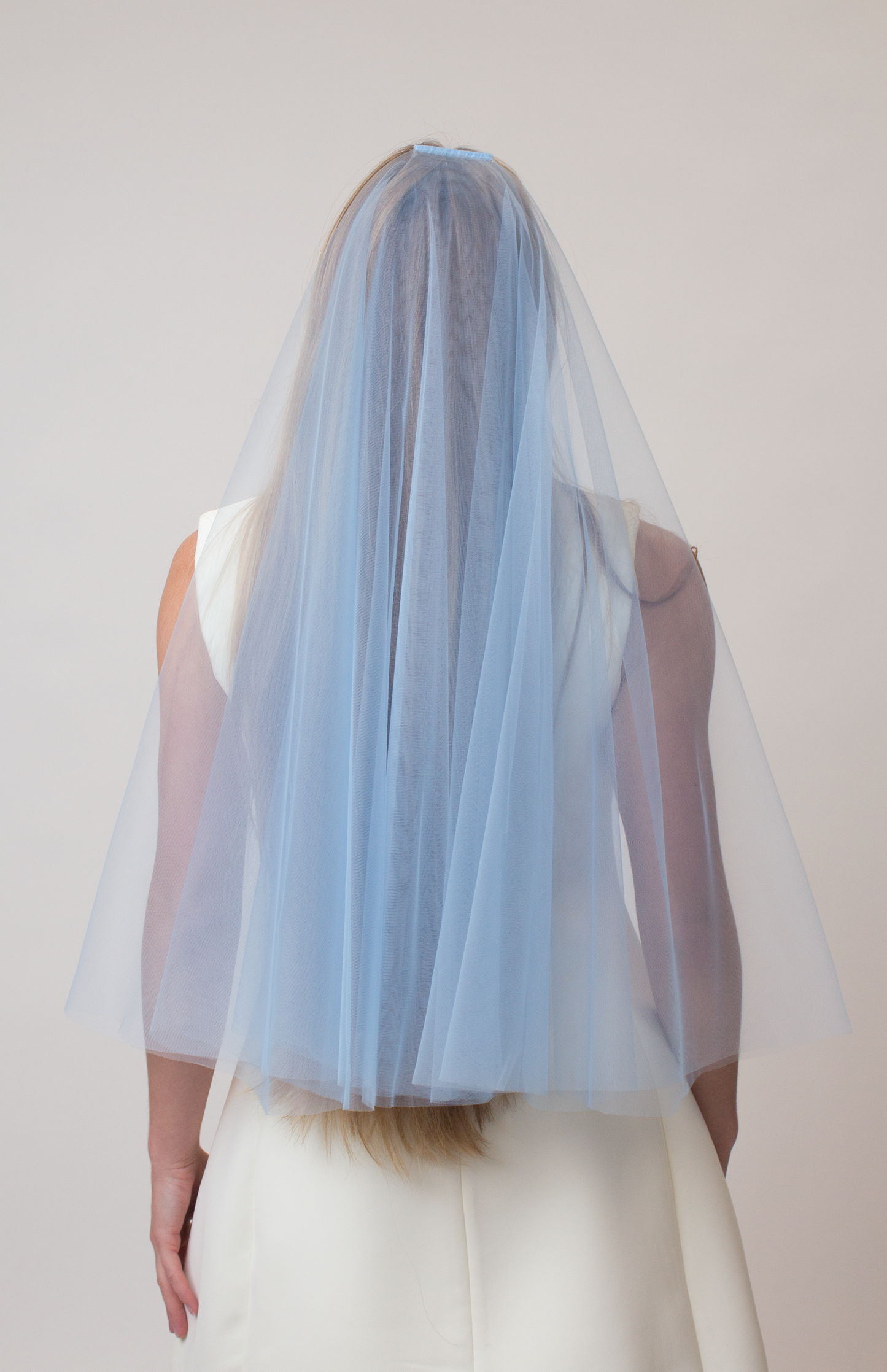 Sky blue veil with a blusher