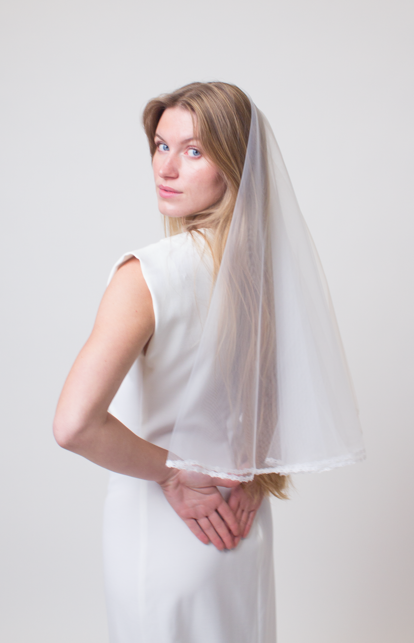 Elbow length floral lace bridal veil