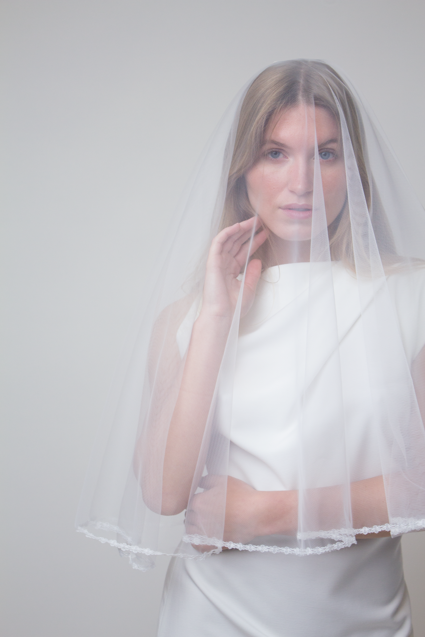 Elbow length floral lace bridal veil