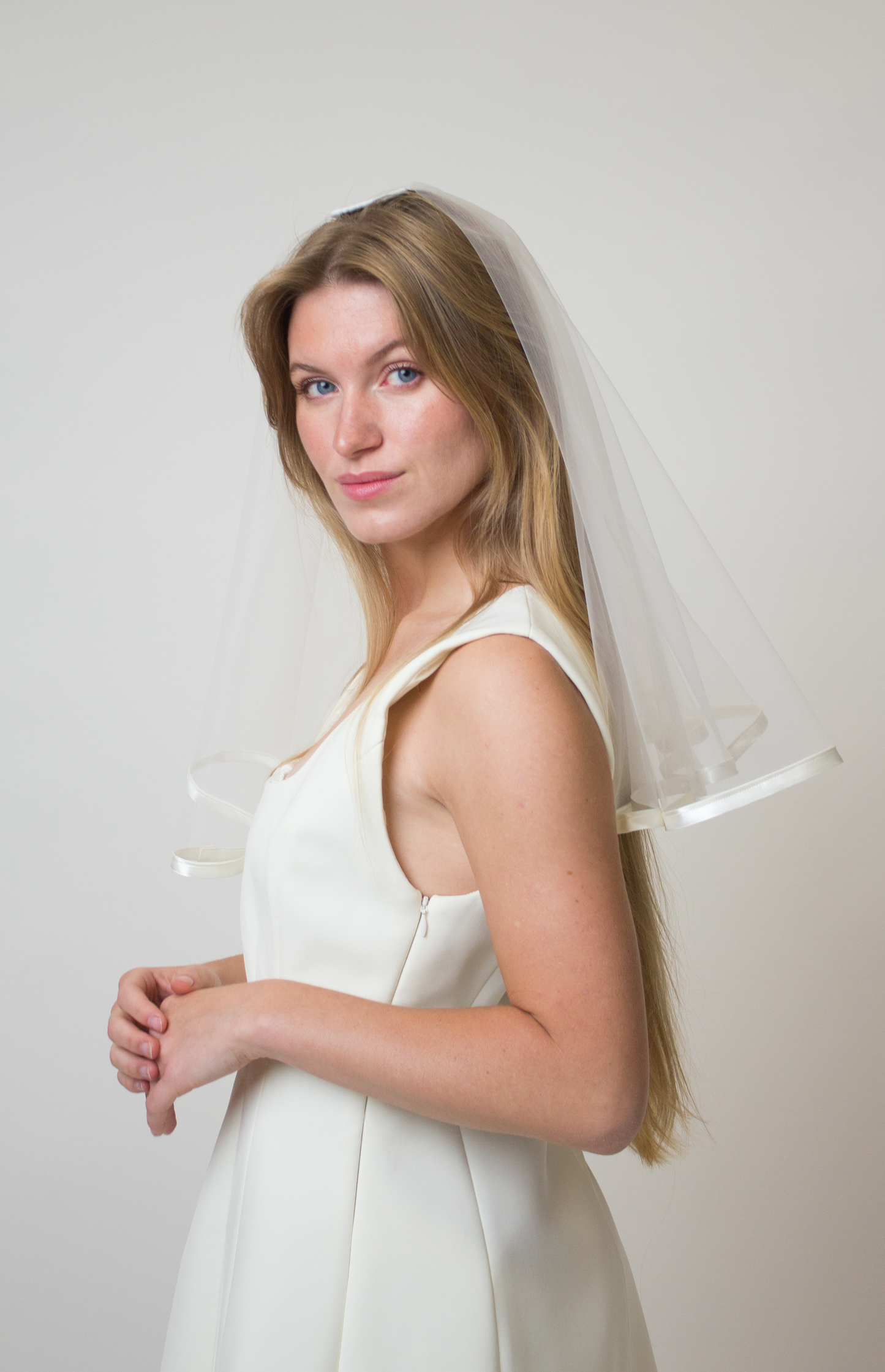 Satin trim bridal veil with blusher