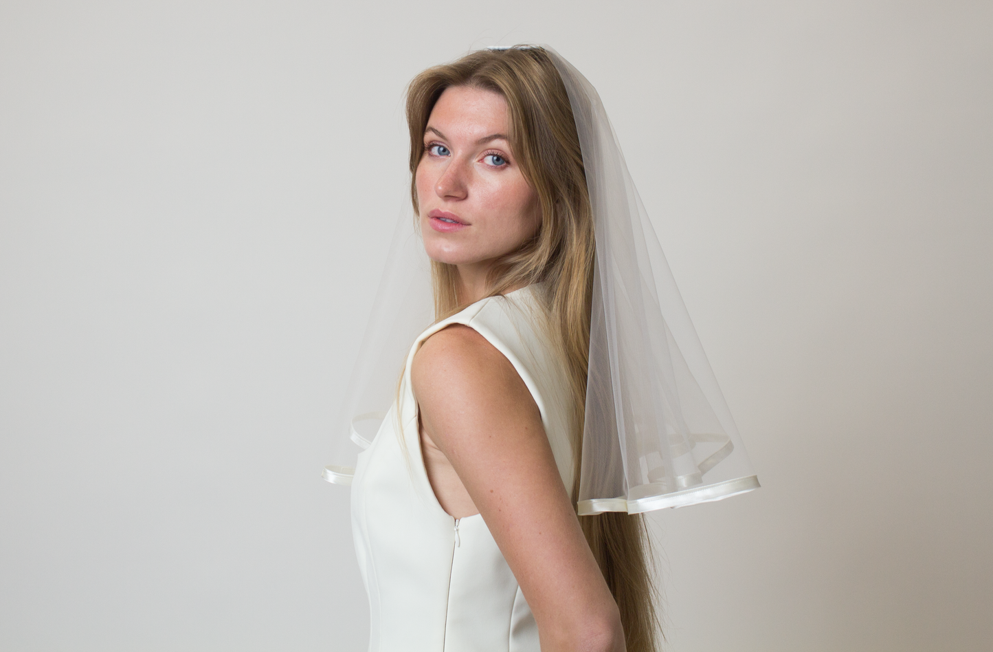 Satin trim bridal veil with blusher