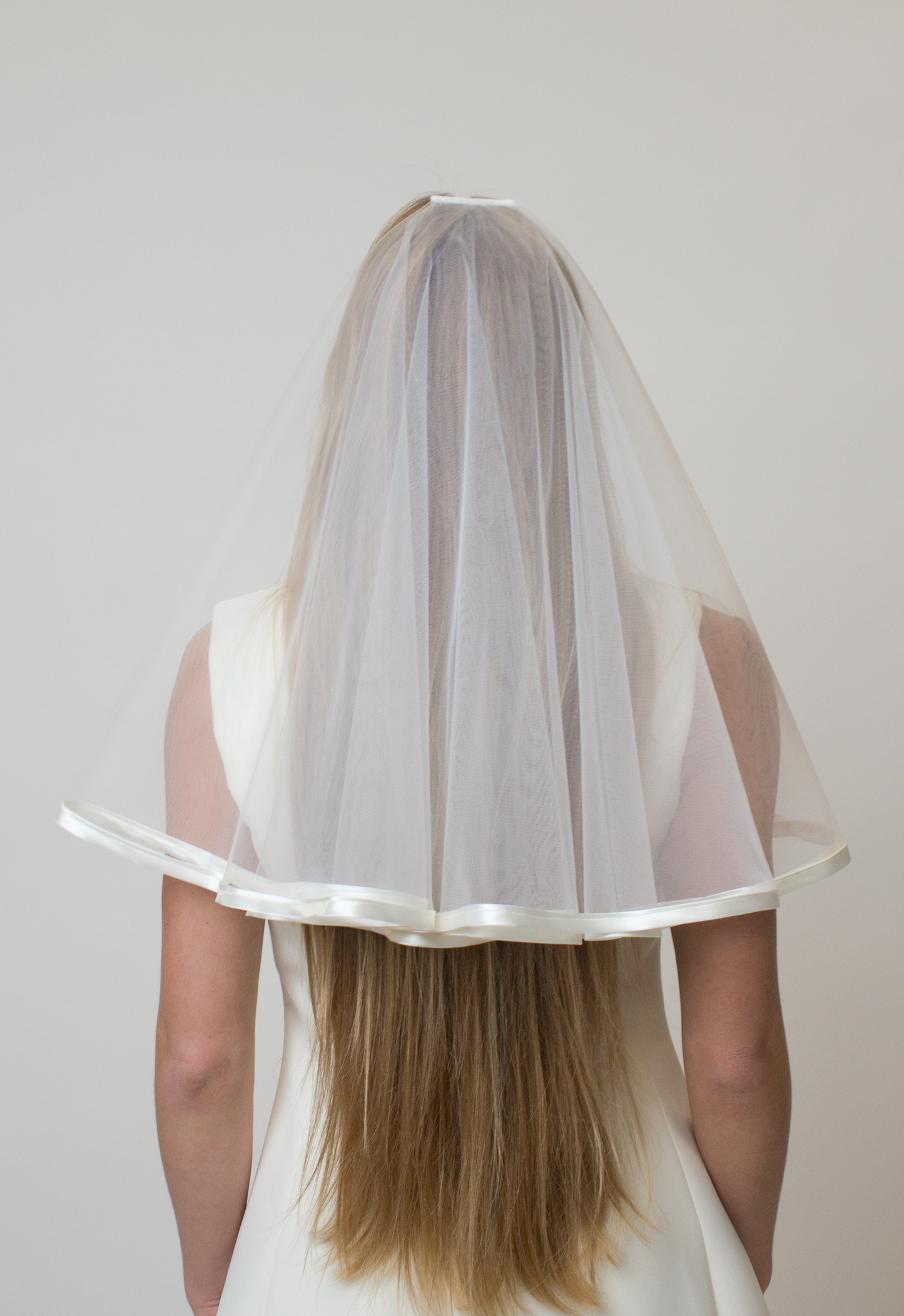 Satin trim bridal veil with blusher
