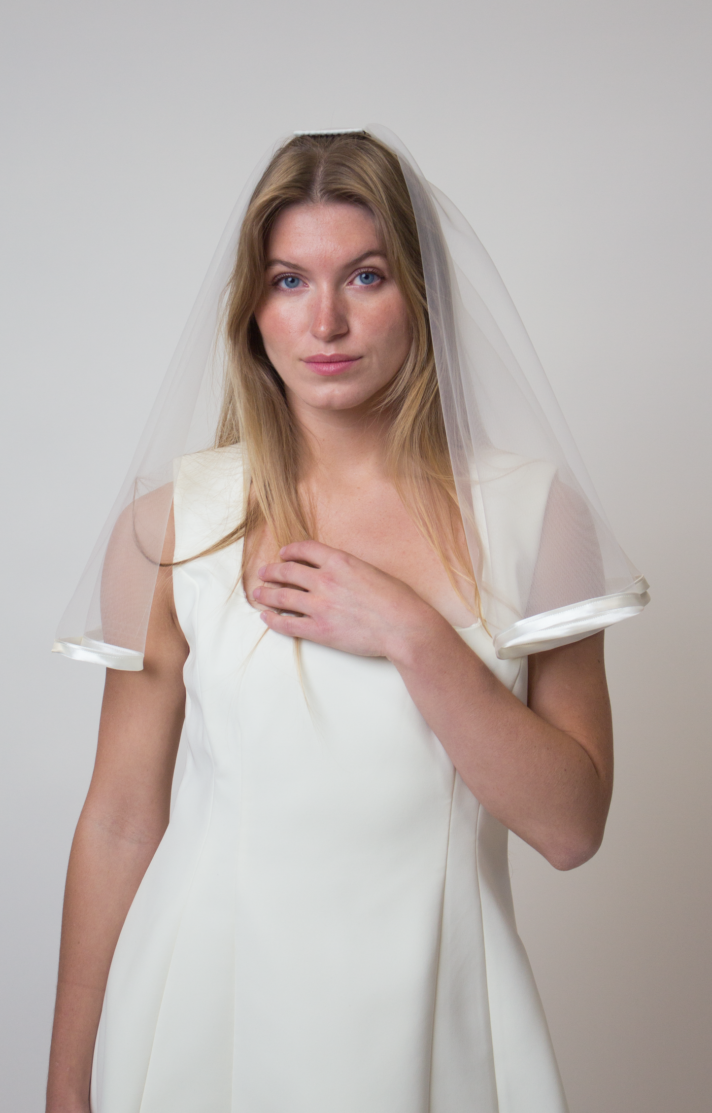 Satin trim bridal veil with blusher