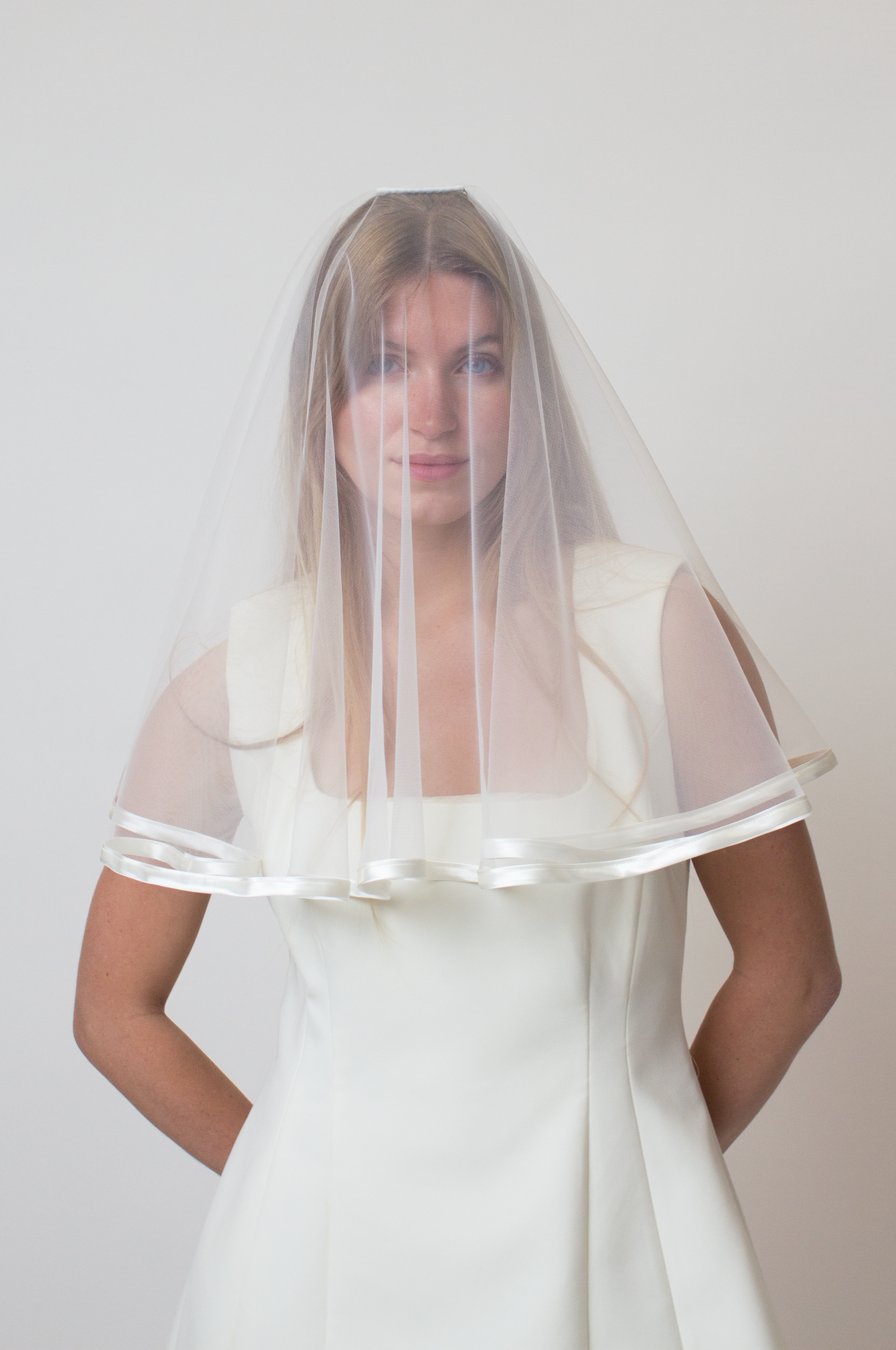 Satin trim bridal veil with blusher