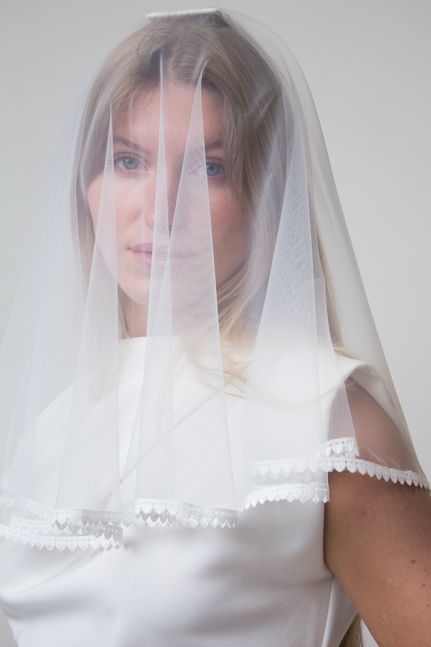 Shoulder length heart lace bridal veil