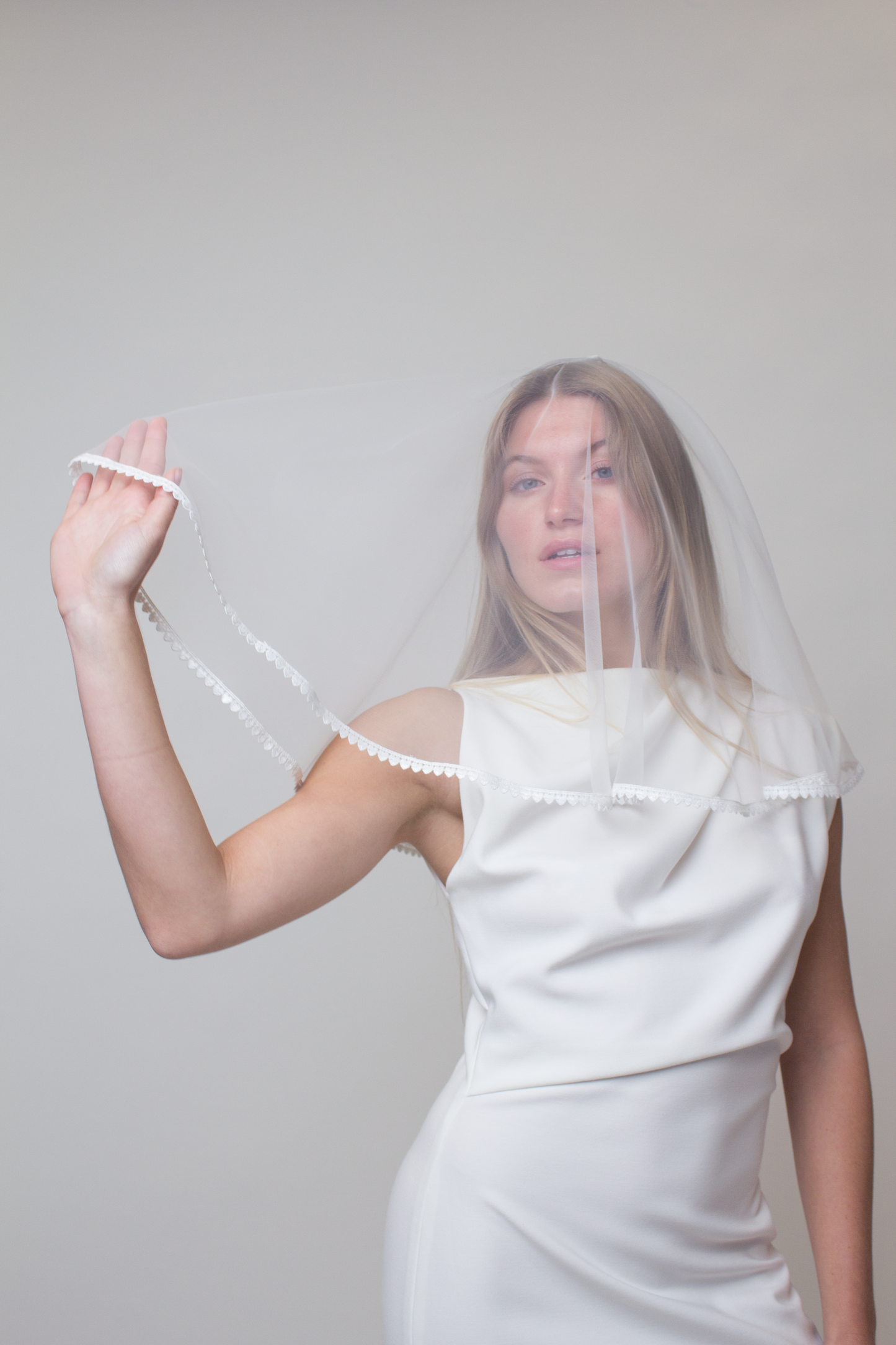 Shoulder length heart lace bridal veil